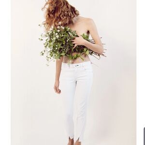 Slightly distressed AMO "twist" cropped jeans